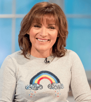 Lorraine wearing a jumper with a rainbow design