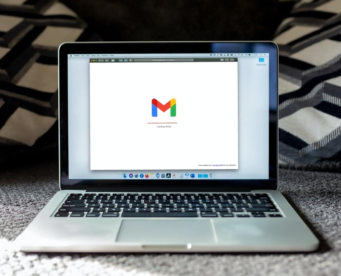 Gmail logo displayed on a MacBook screen